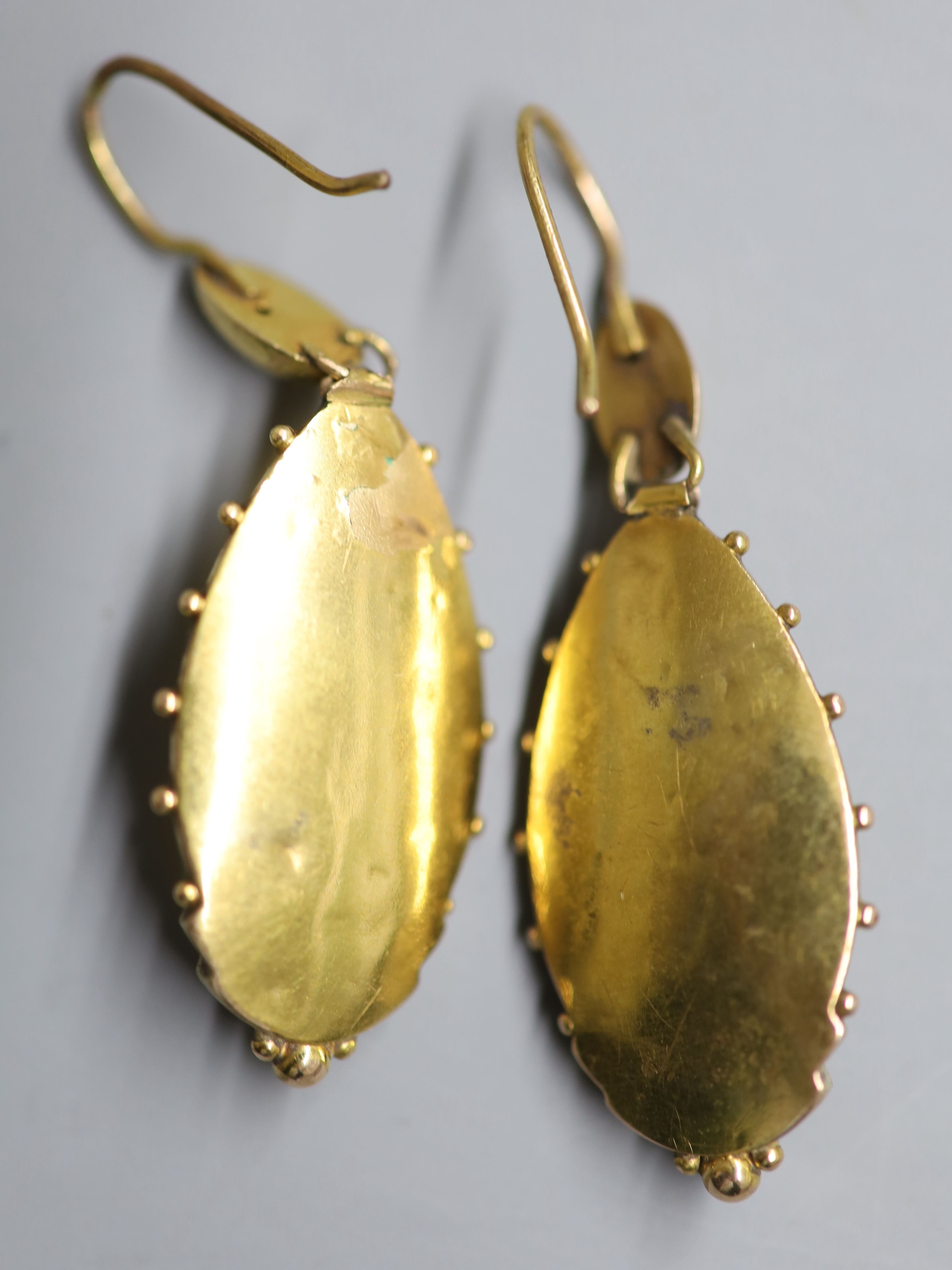 A pair of Victorian yellow metal, enamel and split pearl set ovoid earrings, 42mm, gross 5.5 grams.